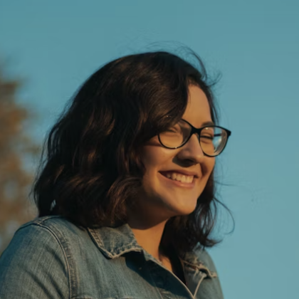 Smiling woman with glasses portrait