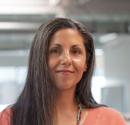 Smiling brunette woman office portrait